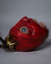 Image 7 of Berserk Egg of the King bleeding eyes pendant, leather cord, brass hardware, OOAK,