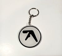 Image 1 of aphex twin keychain