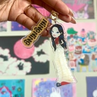 Image 2 of aespa 'dirty work' bratz-inspired keychains.