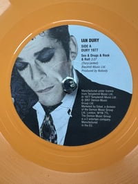 Image 2 of Ian Dury : Sex & Drugs & Rock & Roll, framed 7" orange vinyl record, 2007 limited edition