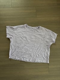 Image 1 of purple lululemon shirt (sz 6)