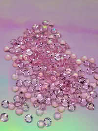 Image 2 of pink translucent nail stone