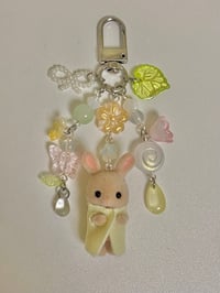 Image 1 of calico critter bunny keychain
