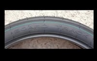 Image 2 of 21 Ribbed Board Track Tire 