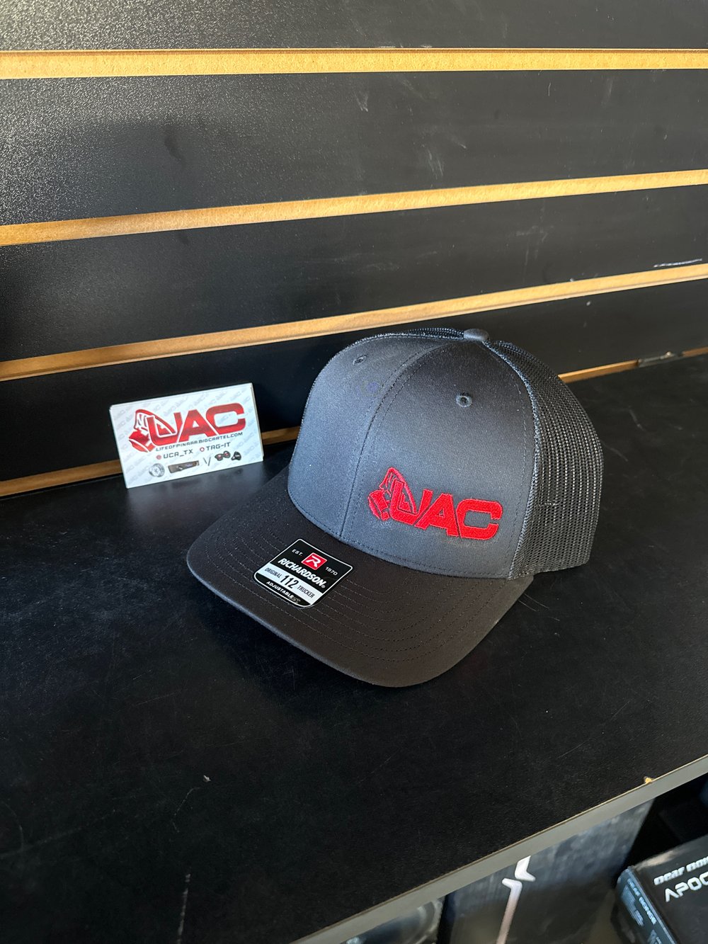 UAC hat red and black 