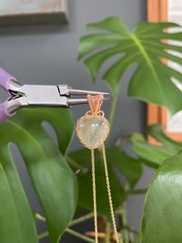 Image 3 of Gold Peridot Heart Crystal Necklace