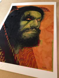 Image 2 of Green man on orange