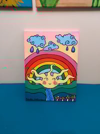 Image 1 of There's always rain, before a rainbow.