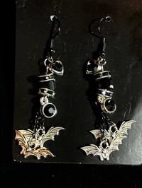 Image 1 of bats dangle earrings 