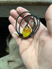 Image 4 of Baltic Amber Skull pendant.