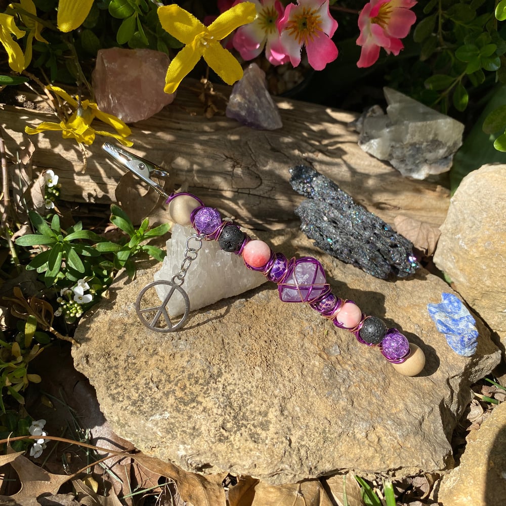 Image of purple magma roach clip