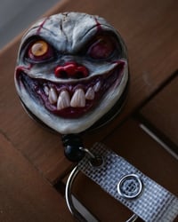 Image 15 of Handmade Pennywise Badge Reel Keychain 