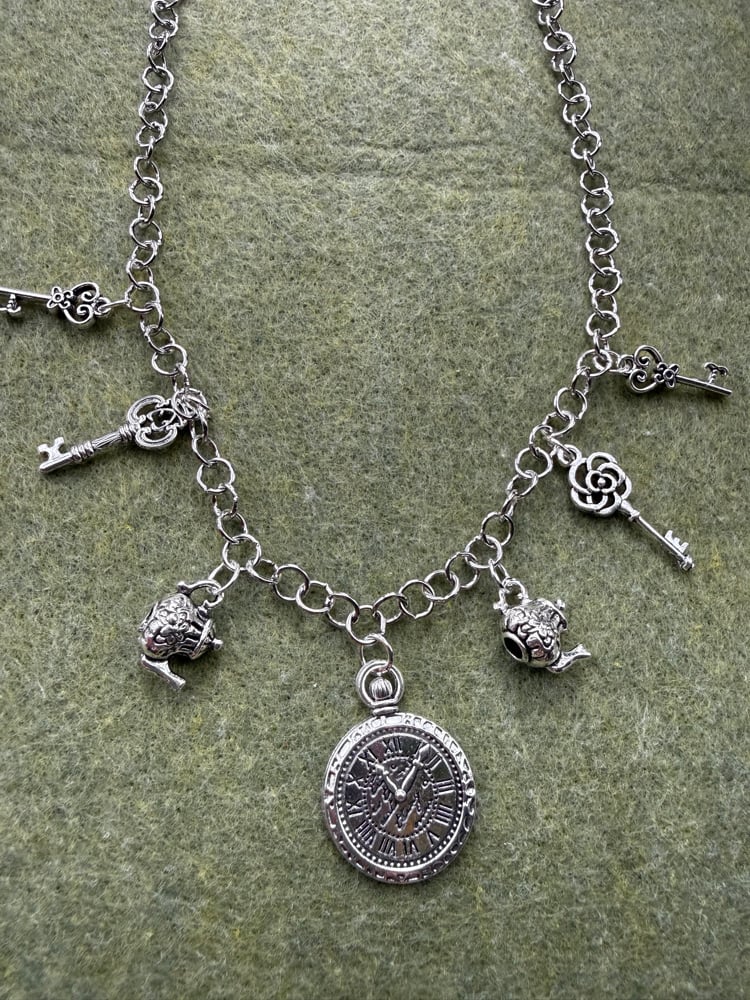 Image of Alice in wonderland inspired necklace ❣️🕰️🫖🐇