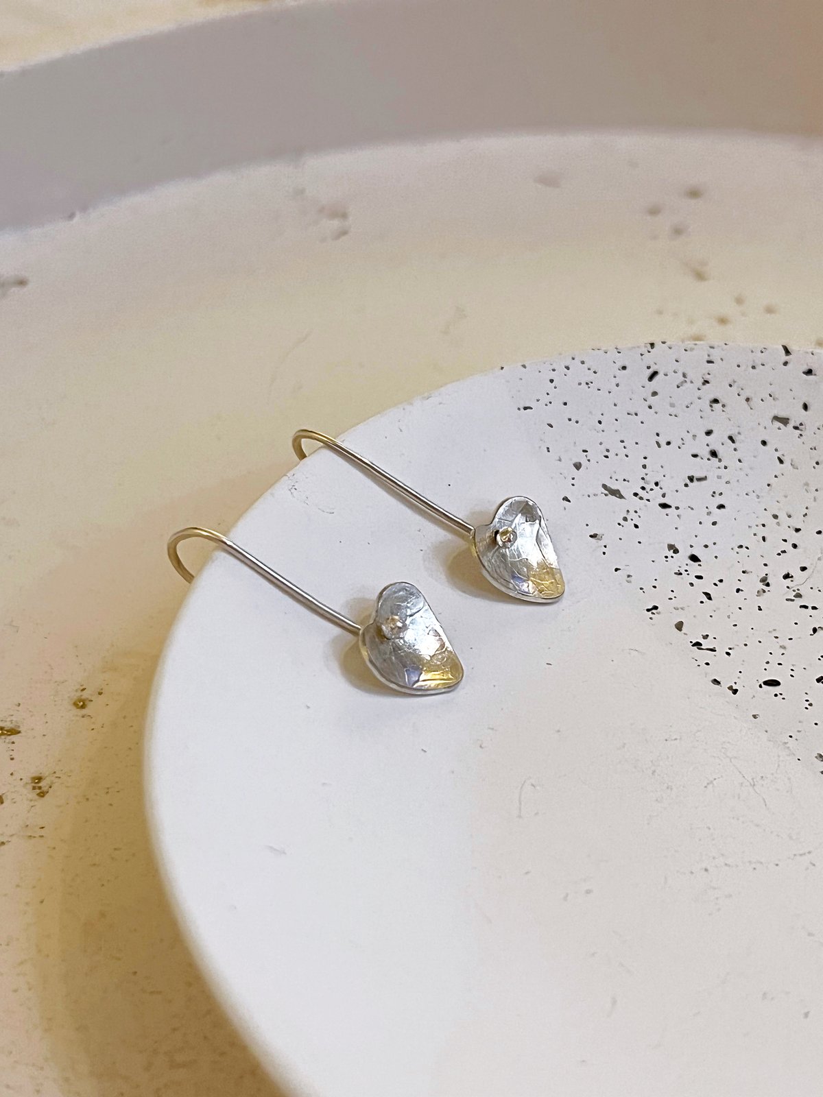Image of Recycled sterling silver heart drop earrings. 