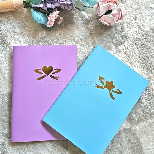 Image of heart x star sticker collection books