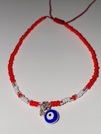 Image 2 of Blue evil eye Red/White bracelet 