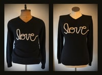 Image 1 of Upcycled “love” cursive yarn sweater in black