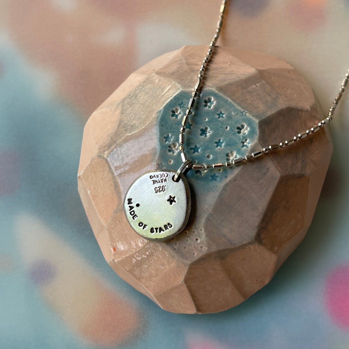 Image of eye and stars necklace