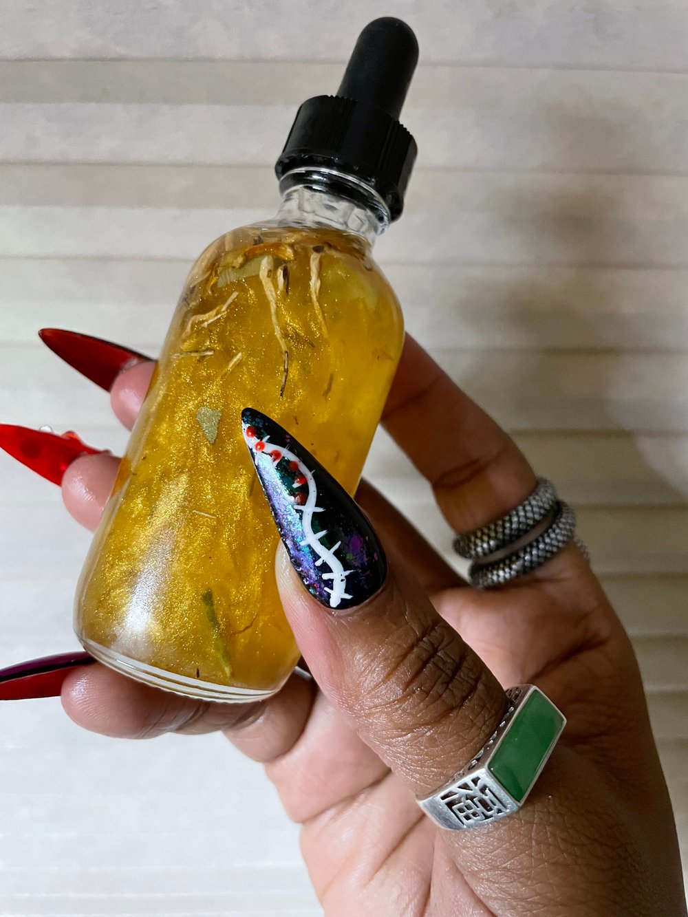 Image of “Think Big Bxtch” Jupiter Oil