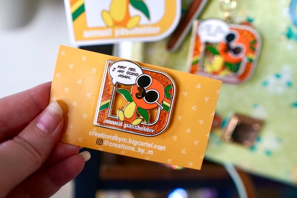 Image of Orange Sunnies AP Parody Pin