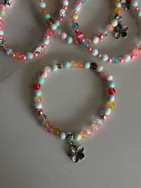 Image 8 of Pastel Beaded Tumbler Bracelet Stack – Pink, Teal & Floral Charm Cup Accessories Set