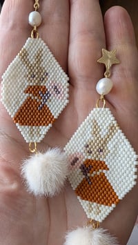 Image 2 of Bunny girl with flower