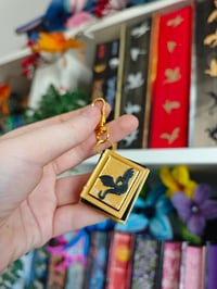Image 4 of Llavero clicker libros dragón 