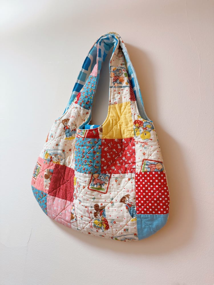Image of Rounded Quilt Tote Bag — Vintage Card