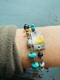 Image 2 of turquoise and opal charm bracelet . be the light quote bracelet