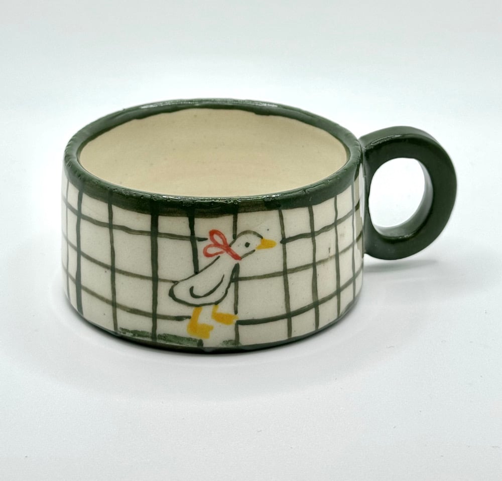 Image of mug coin coin coin