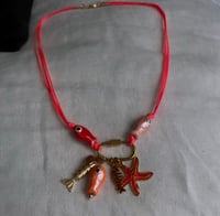Image 1 of collier fish & sea 