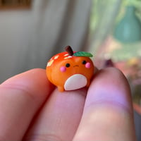 Image 1 of Pumpkin Grumpy Toad Figure