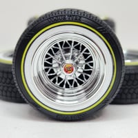 Image 1 of 1:25 15" 30 spoke V tire