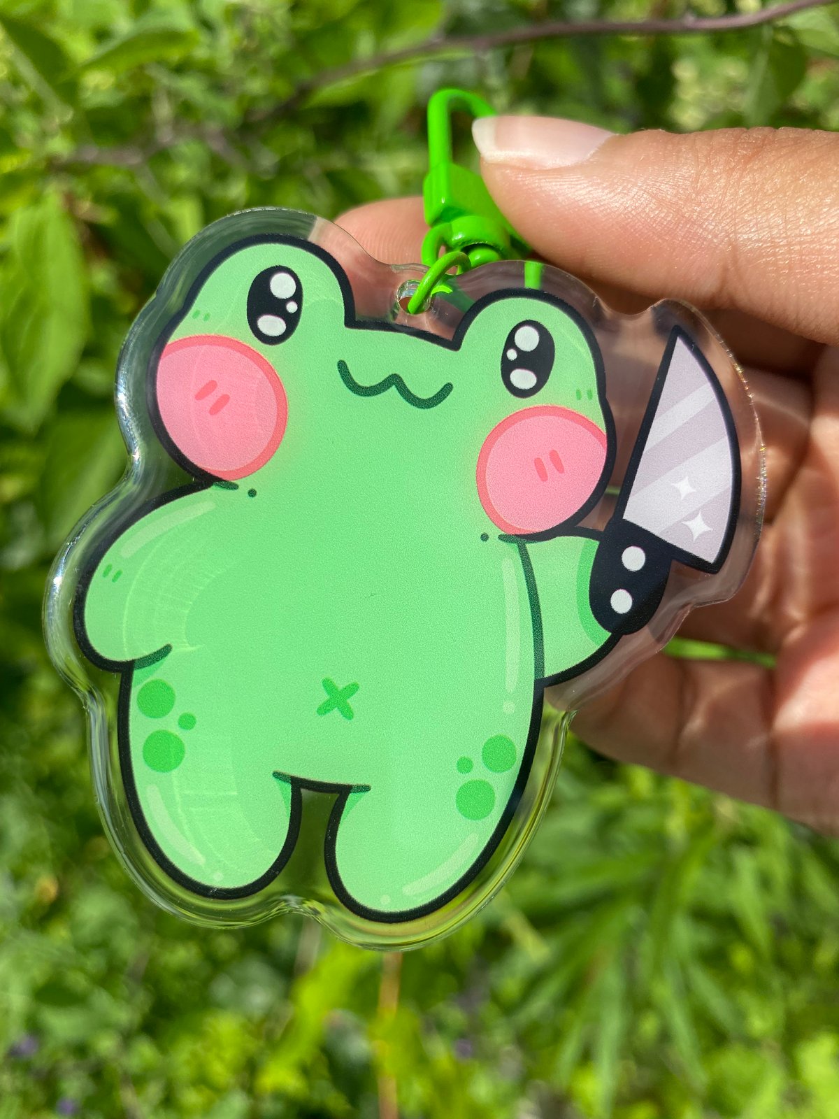 https://assets.bigcartel.com/product_images/d53a1521-a267-46f3-a04c-3114ab1961a2/frog-with-knife-acrylic-keychain.jpg?auto=format&fit=max&h...