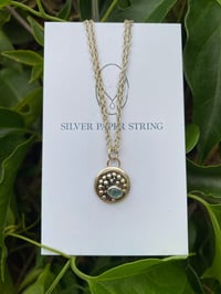 Image 1 of Small stg sil and 9ct gold aquamarine pendant