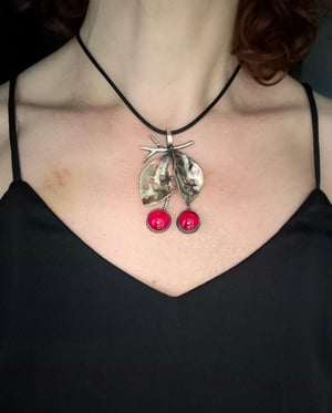 Cherry pendant with bullet casings leave  copy