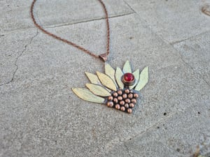 Sunflower pendant with ladybug 