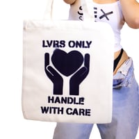"HANDLE WIITH CARE" TOTE BAG