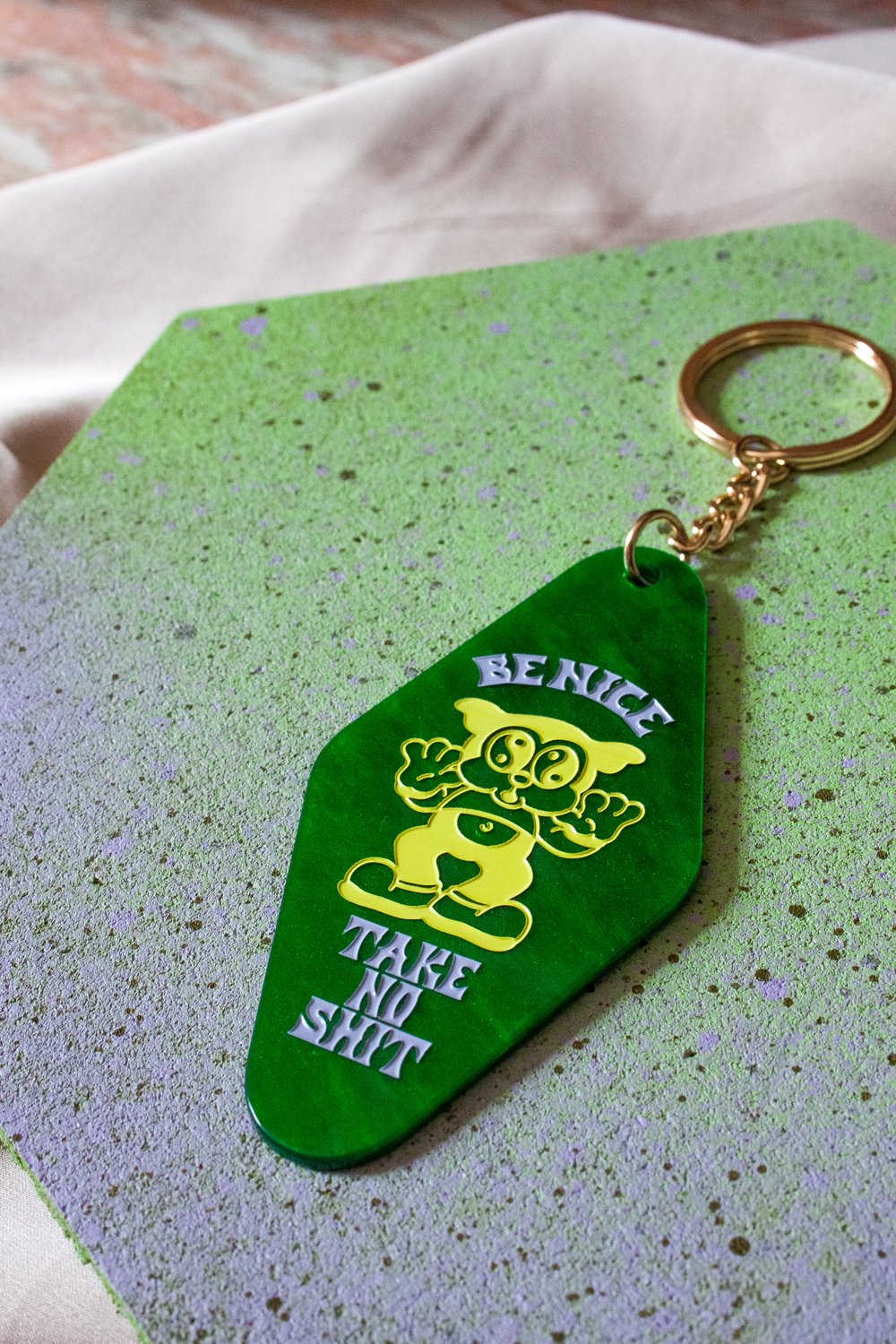 Image of Be Nice Take No Shit Green Motel Key Tag