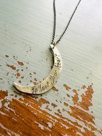 Image 1 of sterling moon with follow your heart inscription