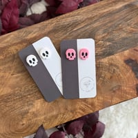 Image 1 of skull studs