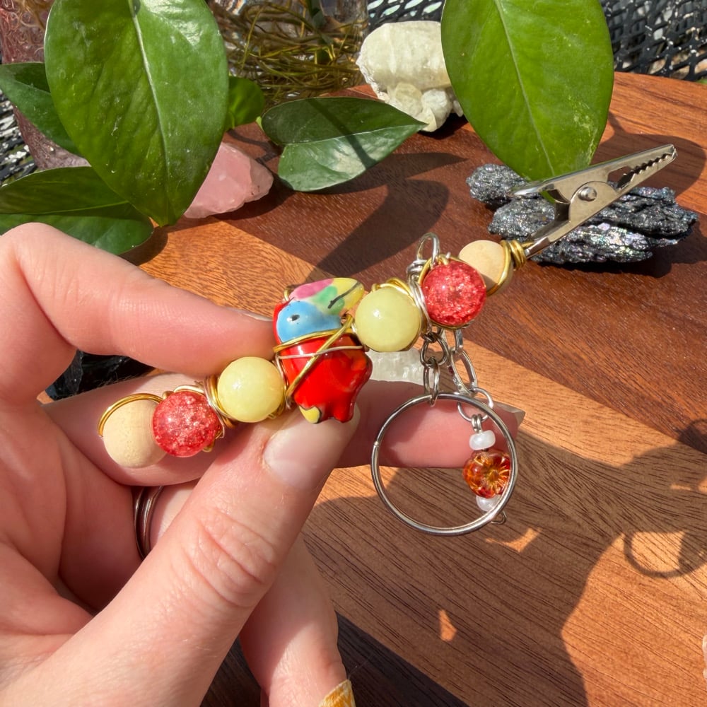 Image of rainbow macaw clip keychain
