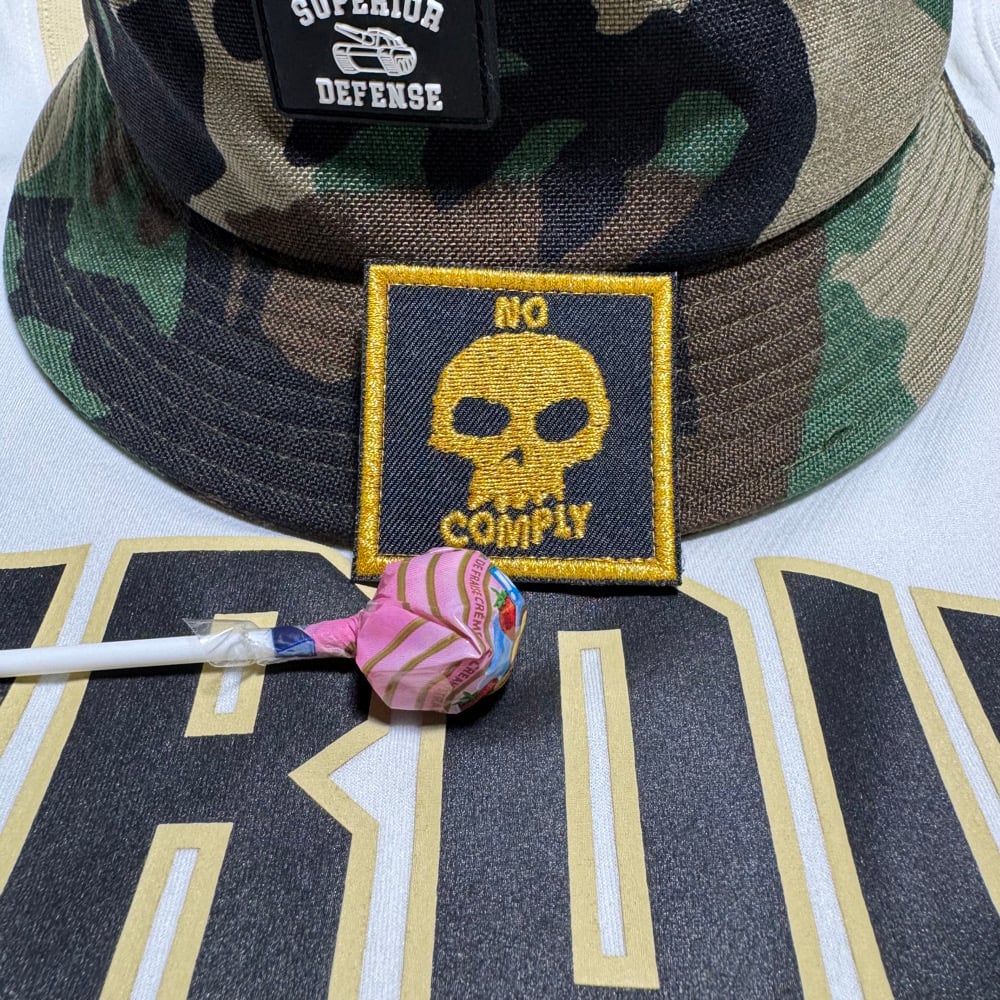 Black & Gold No Comply Patch