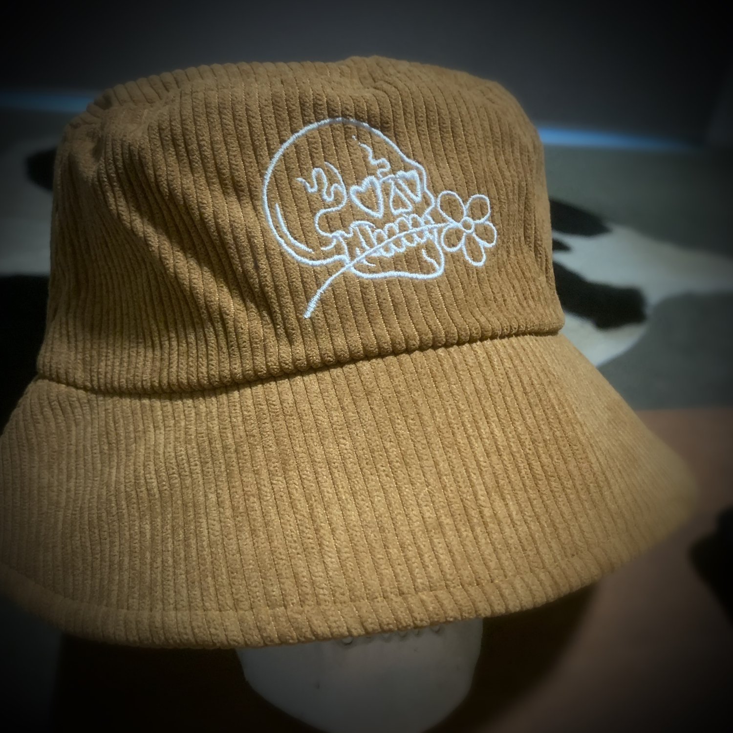 Image of EMBROIDED CORDUROY SKULLY BUCKET HAT