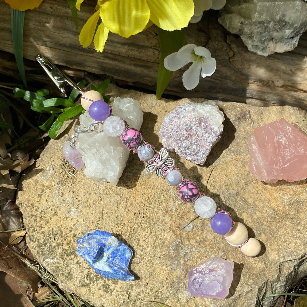 Image of sunset wings roach clip