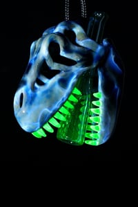 Image 3 of Fade to black T-Rex skull pendant with uv stardust tip & illuminati teeth 🦖😤