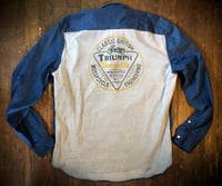 Upcycled “Triumph” t-shirt denim
