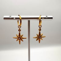 Image 3 of Compass Huggie Earrings