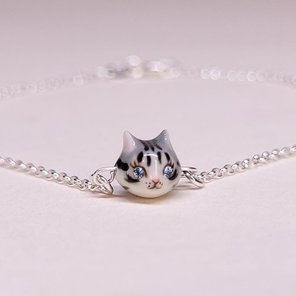 Image of  Teeny Tiny Silver Tabby Porcelain & Sterling Silver Charm Bracelet