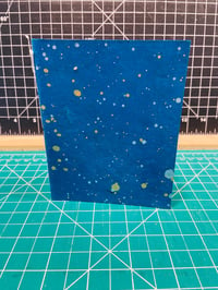 Image 1 of Journal with blue splatter cover 